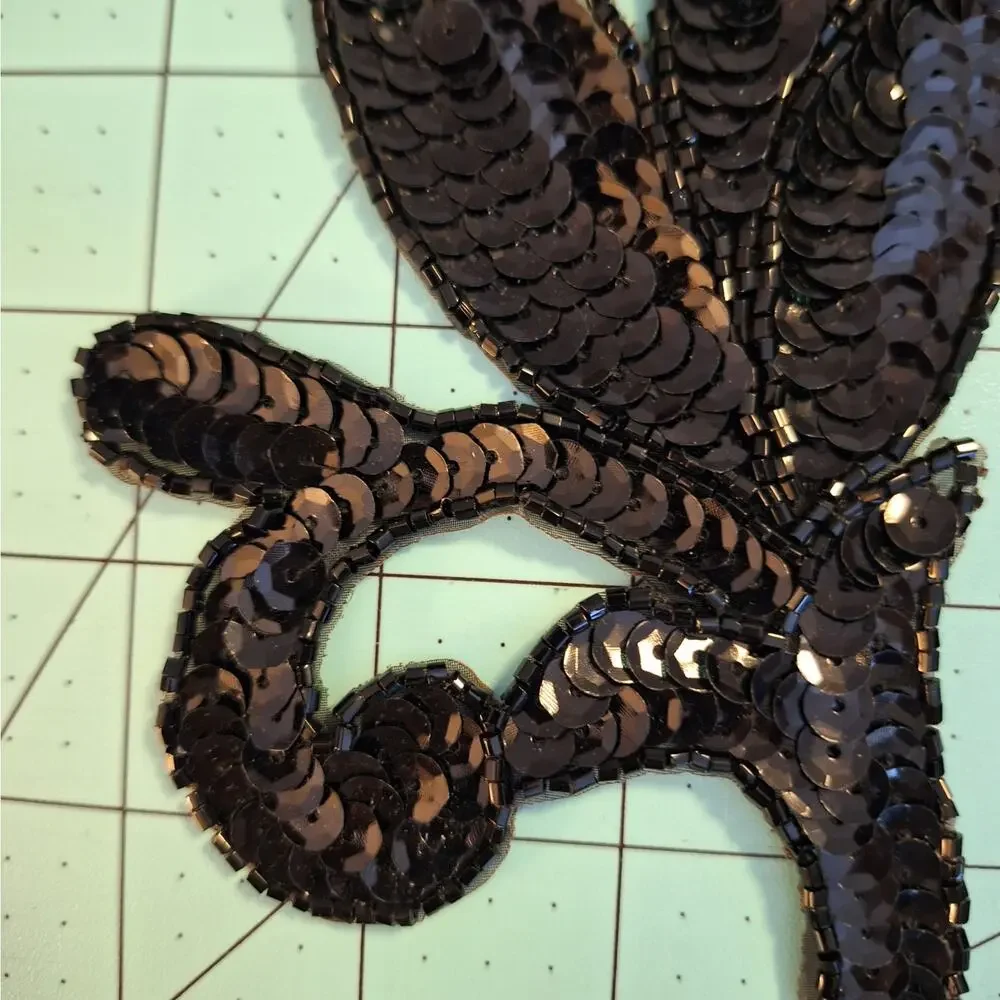 Black sequin applique leaf mirror pair